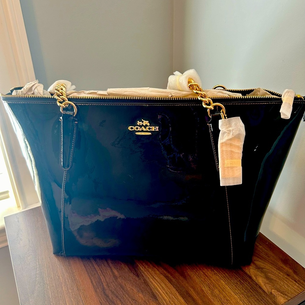 Beautiful New with Tags.  Coach black patent leather tote.